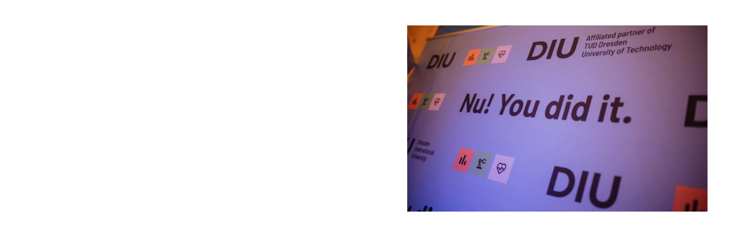 Wand mit Text 'Nu! You did it.' und Logos von DIU und Partnern.